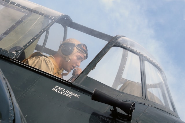 Pilot sitting in the cockpit of an aircraft